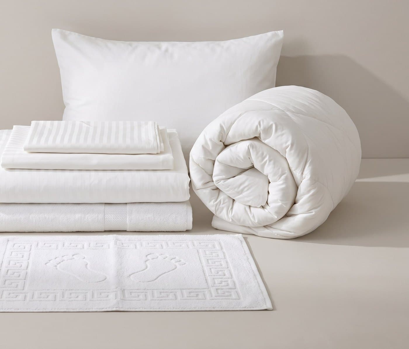 Sleep Kit: pillow, duvet, sheets, towels and a bath mat