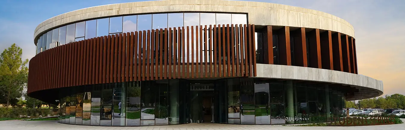 Faculty building with rust-coloured louvres
