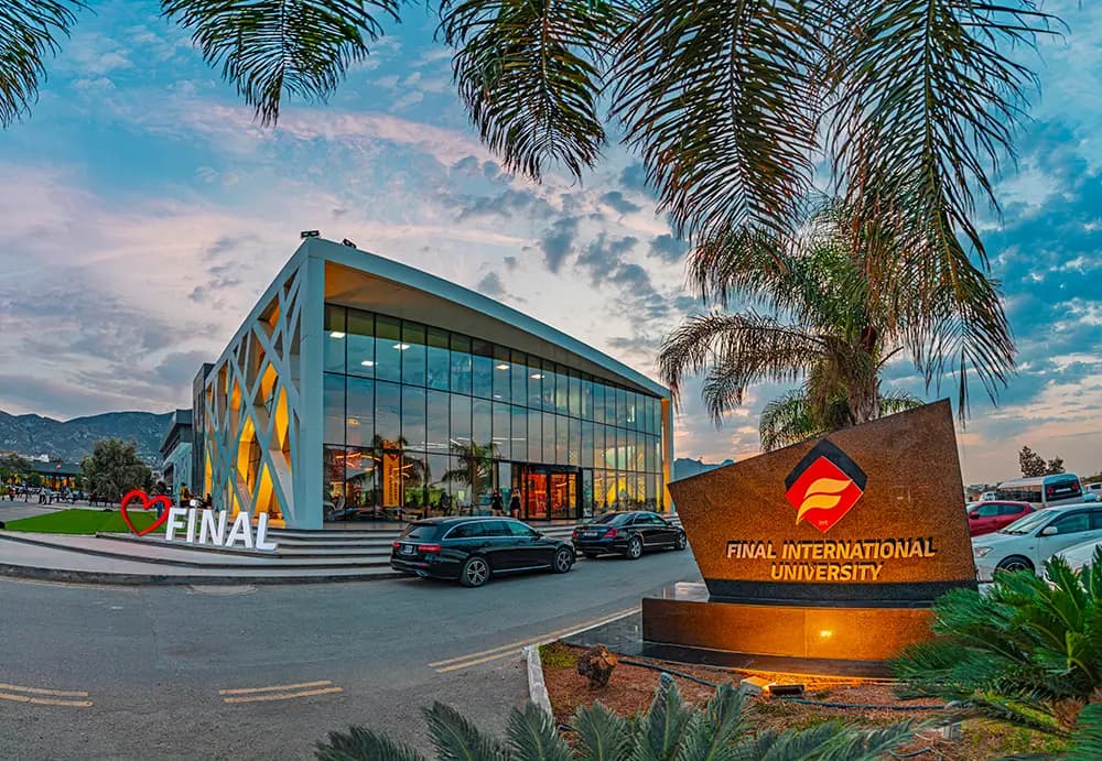 Campus building and entrance at dusk