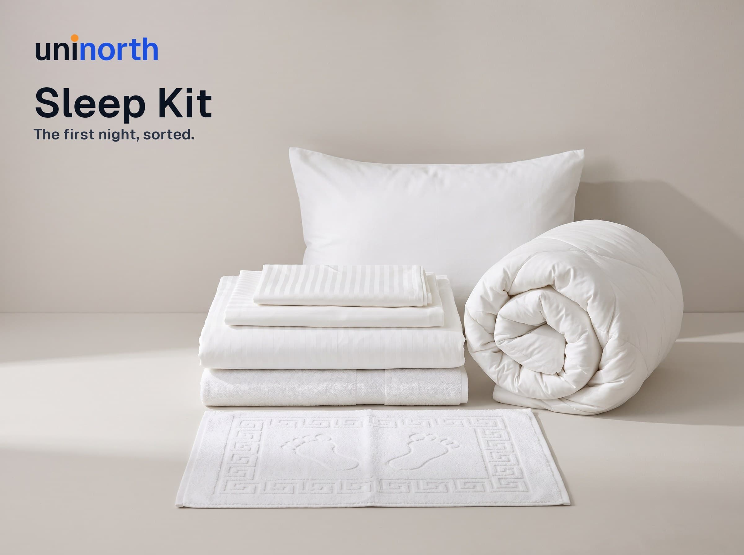 Sleep Kit: striped satin duvet set, microfibre duvet, pillow, bath and hand towels and terry foot mat